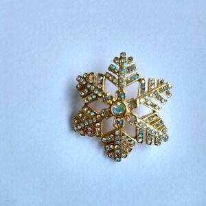 Gold Tone Snowflake Brooch with Multicolor Accents